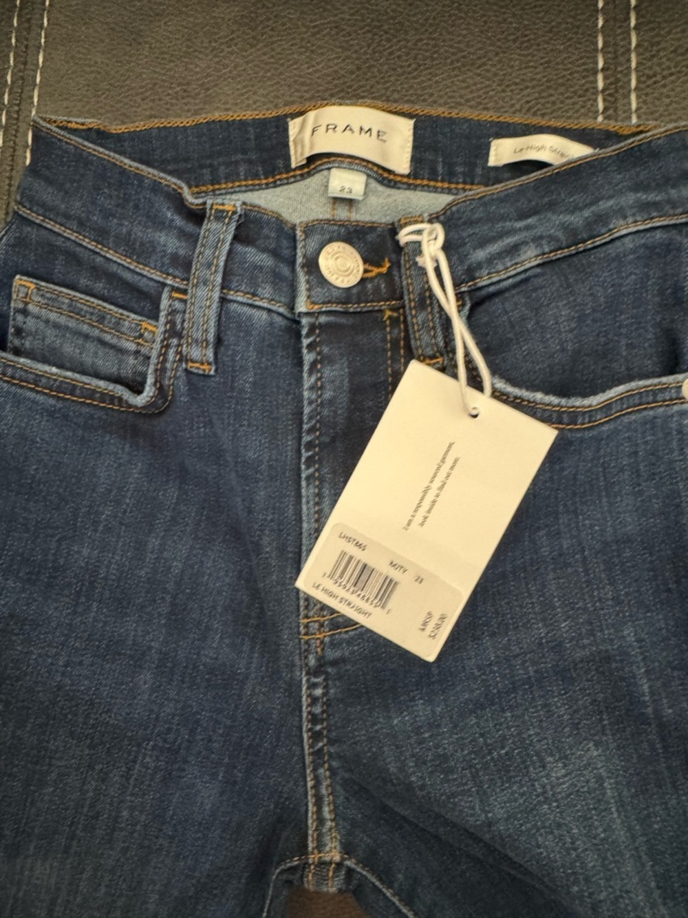 Frame Denim High-Rise Skinny Jeans in Dark Blue Wash